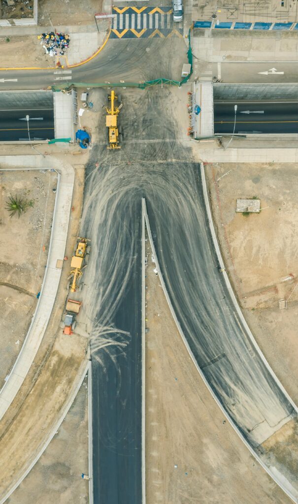 Aerial shot of road construction site in Lima, showcasing infrastructure development in Peru.